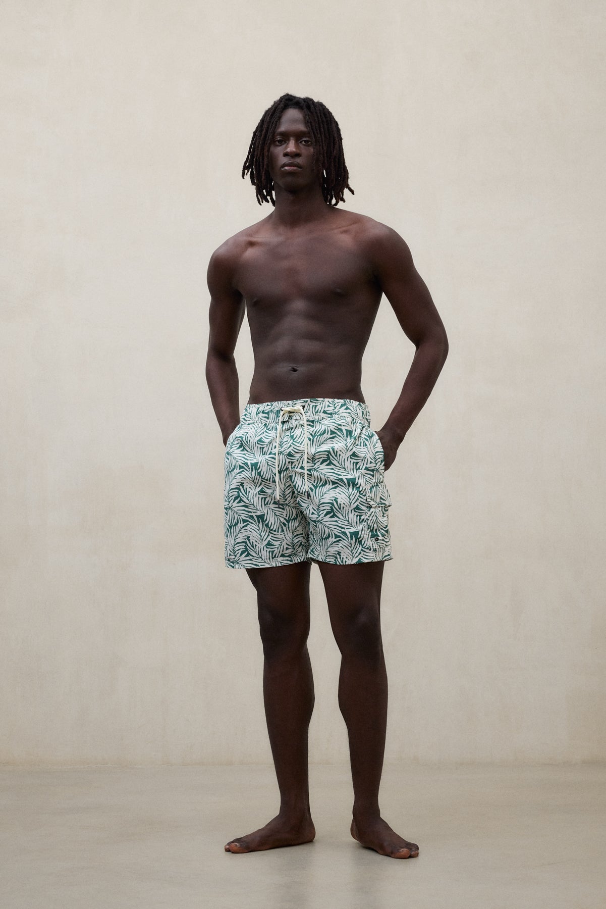 GREEN BIQUE SWIM TRUNKS