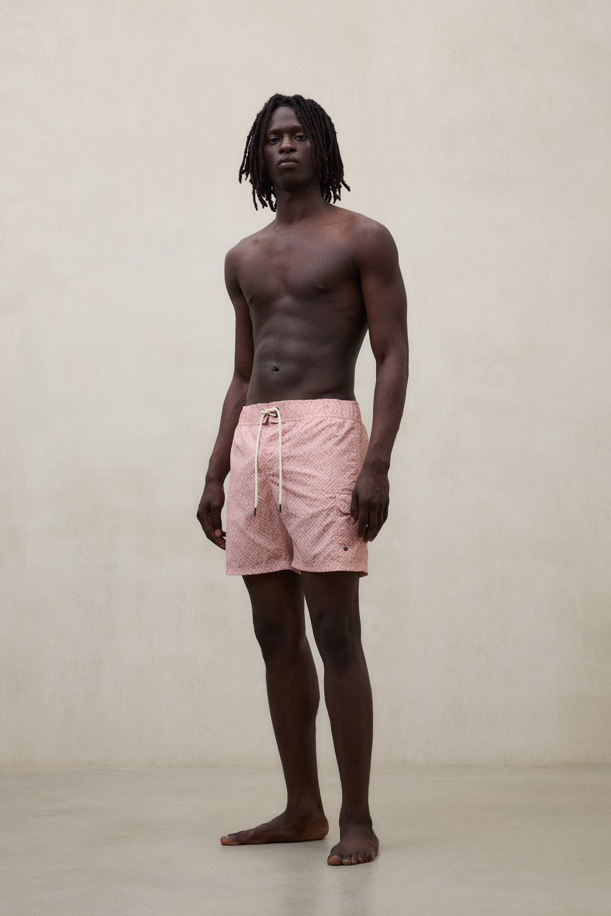 PINK BIQUE SWIM TRUNKS