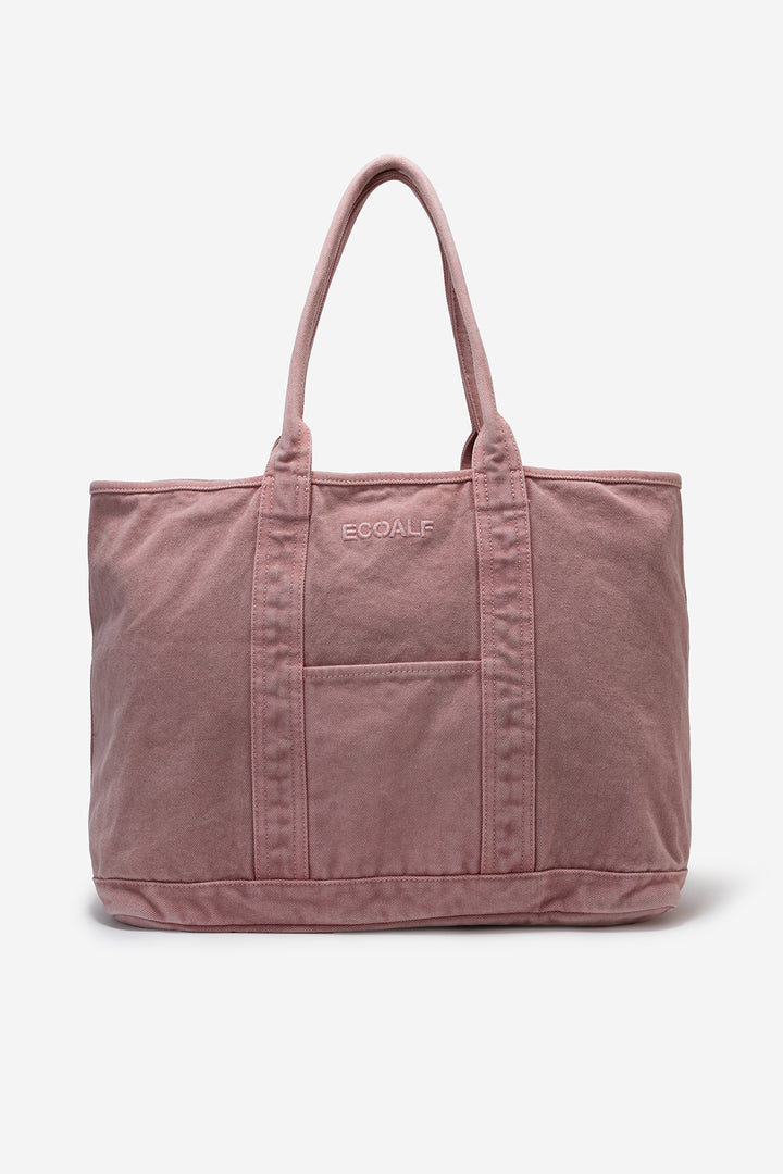 Un bolso grande de tela rosa claro sostenible con asas dobles y un bolsillo exterior con la marca "ECOALF" bordada.