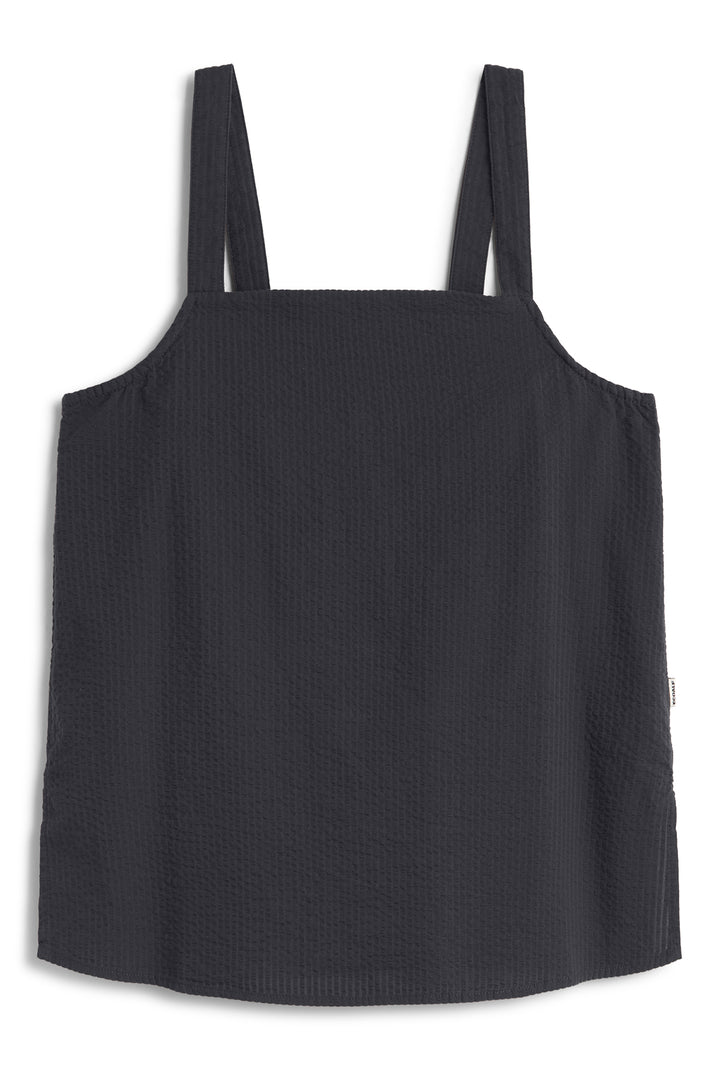 Una blusa de Ecoalf negra sin mangas sostenible, de tejido ligero, corte recto y tirantes anchos.